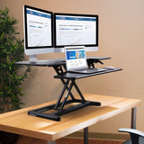 FLEXISPOT Stand up Desk Converter - 42 inches Wide Platform Standing Desk Computer Riser with Deep Keyboard Tray for Laptop (42", Black, M7L)