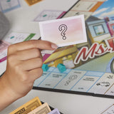 Hasbro Ms. Monopoly Board Game; First Game Where Women Make More Than Men; Features Inventions by Women; Game for Families and Kids Ages 8 and Up